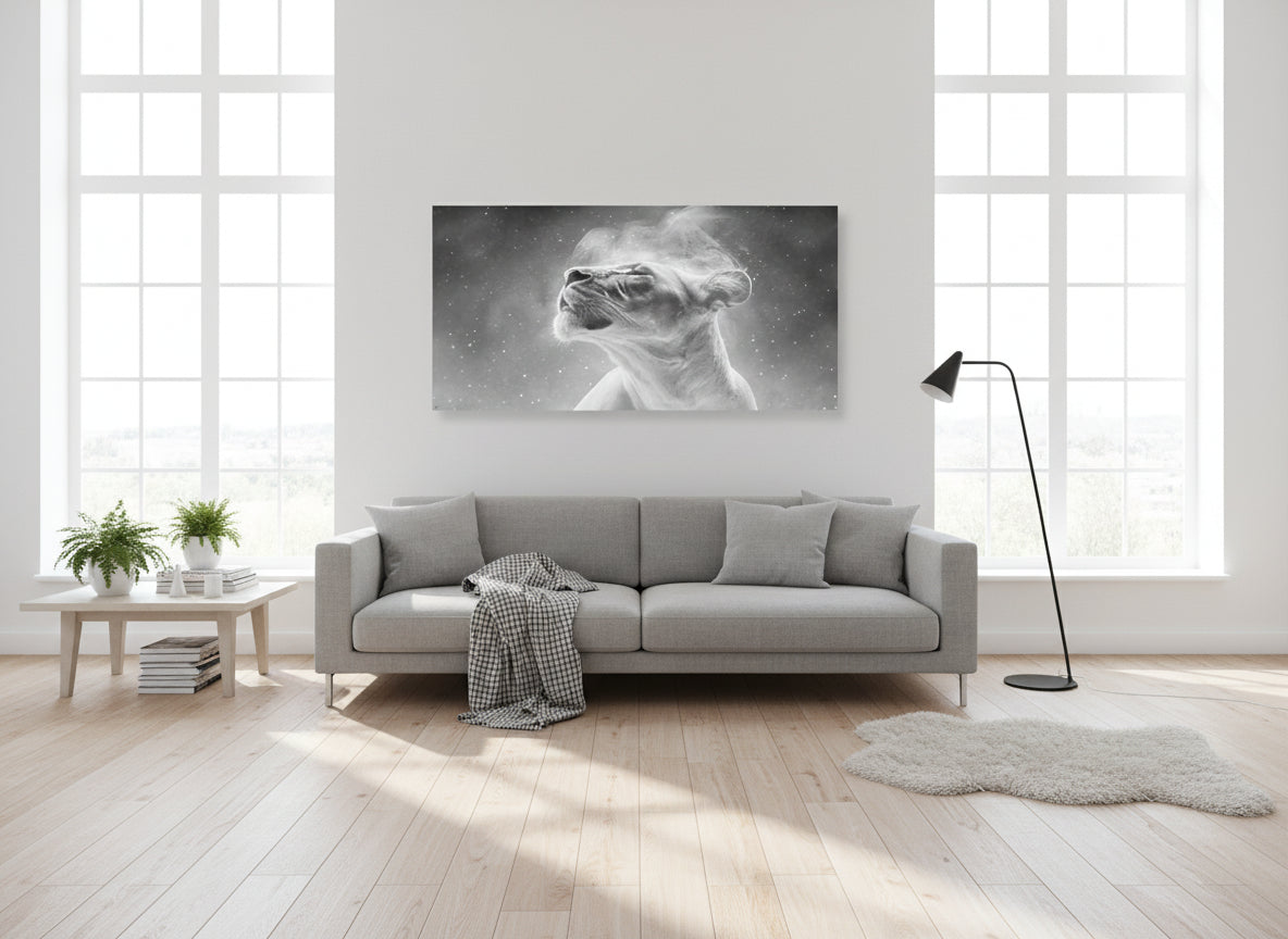 Modern living room with a gray sofa, coffee table, and a  large fine art print on the wall of an etheral lioness, 