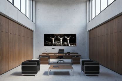 Modern office interior with a large desk and wall-mounted fine art piece displaying deer images.