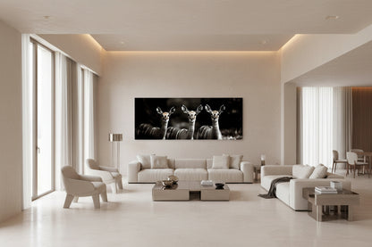 Oversized wall art featured in a modern white living room with floor-to-ceiling windows and minimalist furniture.