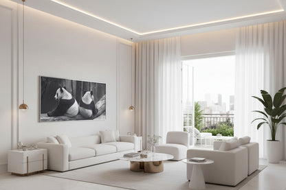 Large panda artwork mounted above low profile seating area in luxury hotel suite with soft lighting, sheer curtains, balcony with a city view