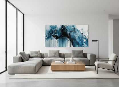 Modern living room with a gray sectional sofa, wooden coffee table, and abstract fine art lioness print on the wall.