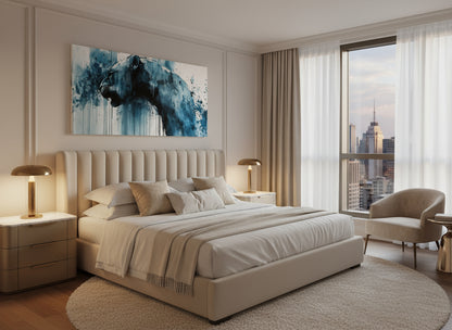 Modern bedroom with beige bed, nightstands, and a cityscape view,  abstract fine art lioness print on the wall above the bed.