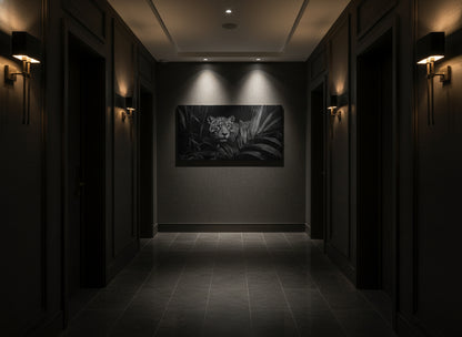 Dark hallway with a large fine art print of a jaguar in a dimly lit room.